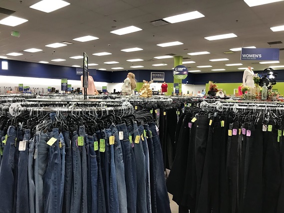 Circular racks of jeans at the GJ Goodwill store