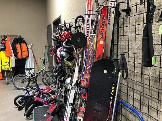 The separate outdoor room has bikes, ski and snowboard equipment, golf clubs and more.